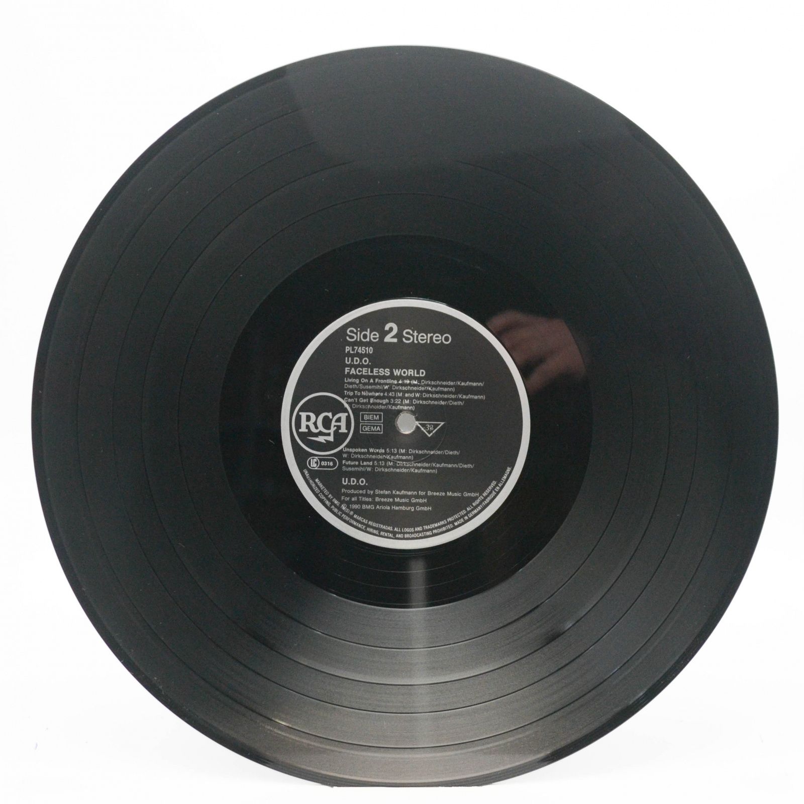 U.D.O. — Faceless World, 1990